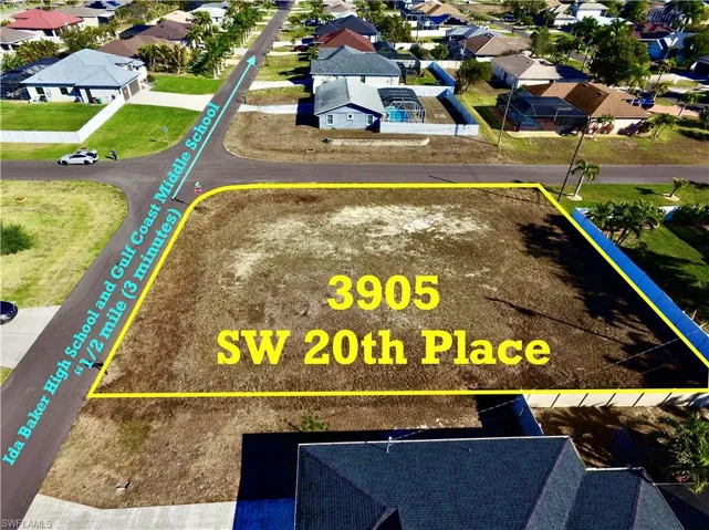 Aerial perspective of suburban area with property parcel outlined