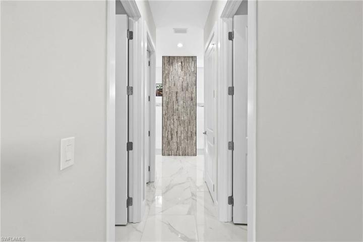 To master bath- feature wall/shower wall