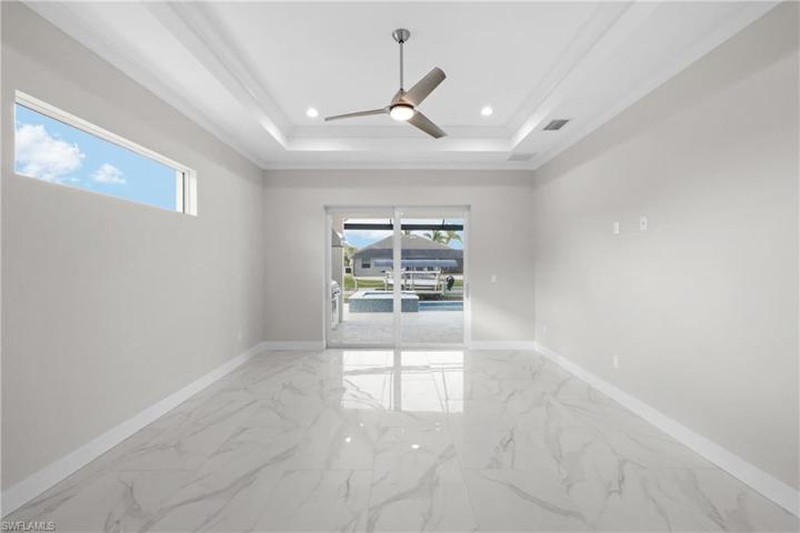 Coffer ceiling in master with sliders to outsde