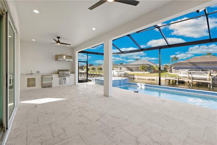Screened patio with beautiful summer kitchen