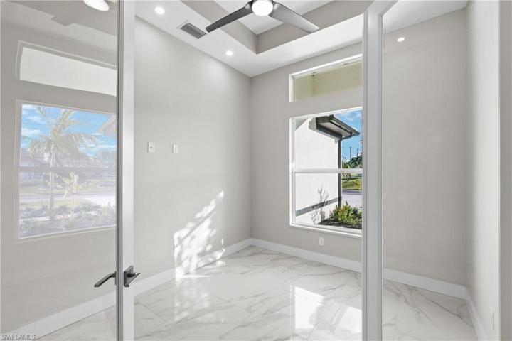 Off family room with glass doors