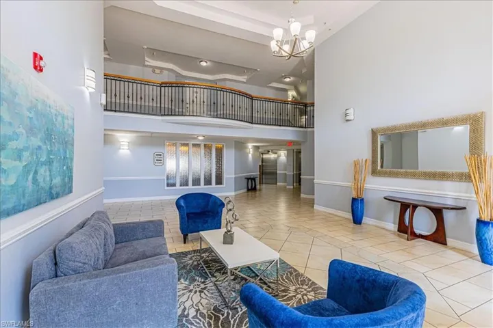 Common area featuring a high tray ceiling