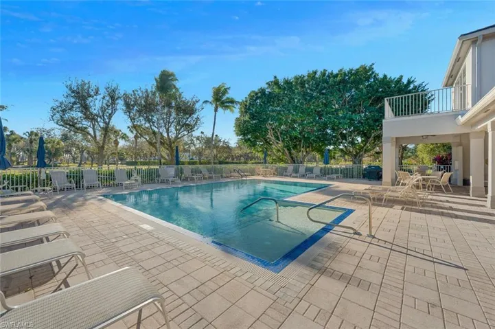 Community pool featuring a patio area