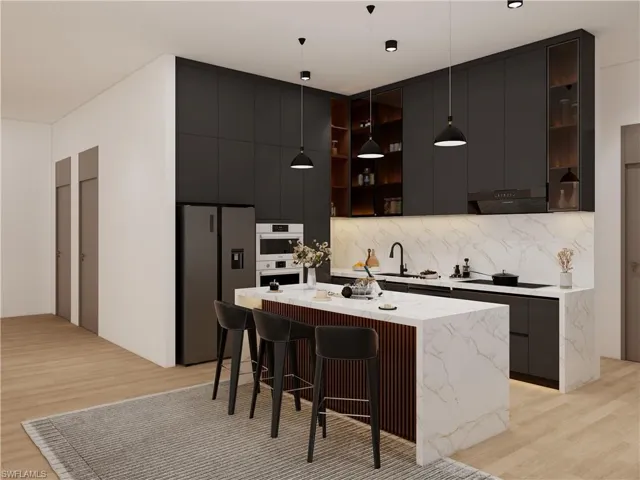 Kitchen with modern cabinets, stainless steel appliances, a kitchen island, and a kitchen breakfast bar (Rendered photo)