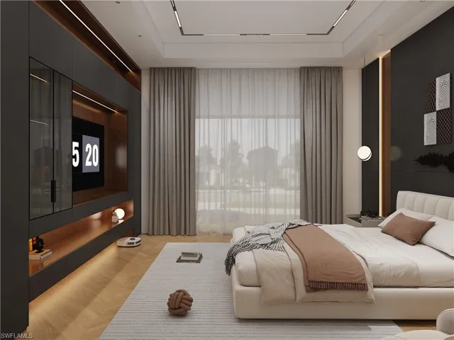 Bedroom featuring parquet flooring and a raised ceiling (Rendered photo)