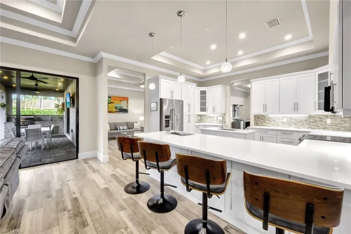All main living areas offer access to the lanai/pool.