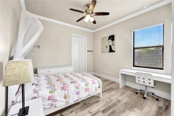 Second bedroom offers landscape views.