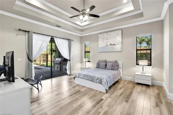 Primary suite offers access to the pool.