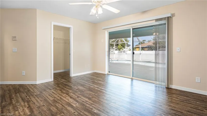 Primary bedroom with walk in closet
