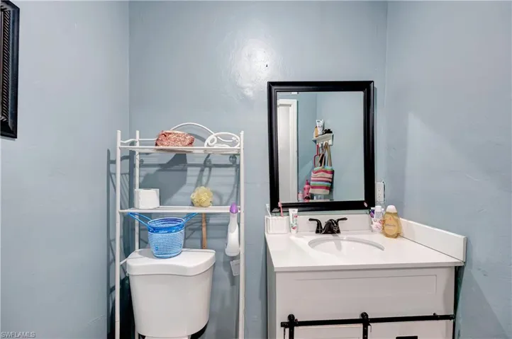 Bathroom with toilet and vanity