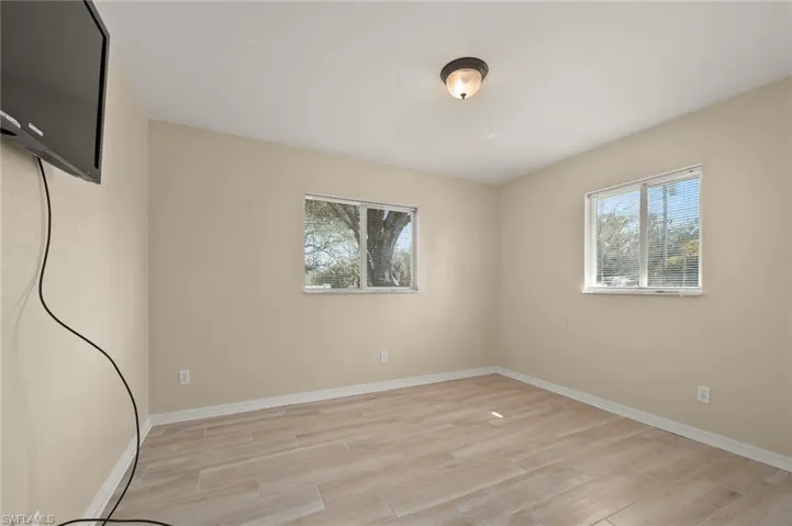 Spare room featuring light hardwood / wood-style floors