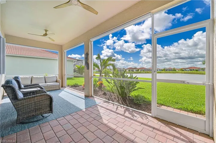 Sunroom featuring ceiling fan