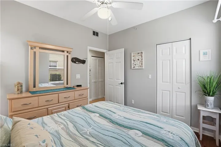 Bedroom with a closet and a ceiling fan