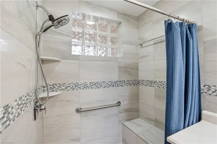 Bathroom with tiled shower
