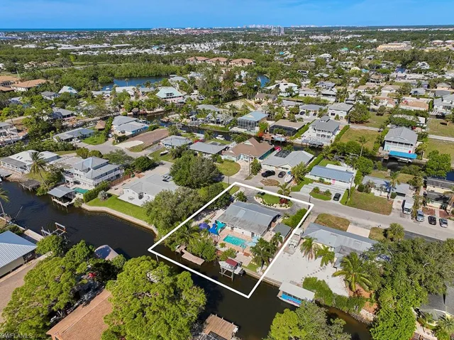 Bird's eye view of rear property and water view