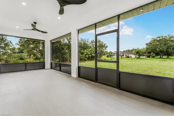 Unfurnished Lanai featuring ceiling fan and healthy amount of natural light