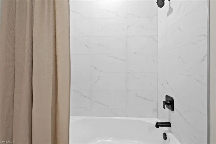 Bathroom featuring shower / tub combo