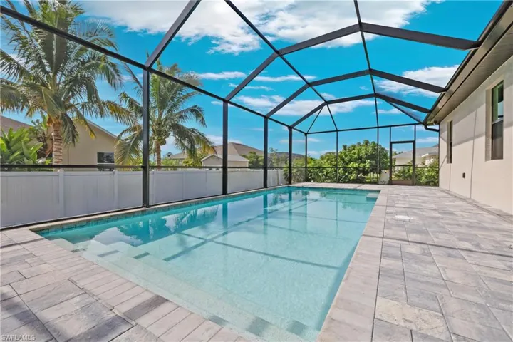 View of pool featuring a lanai and a patio