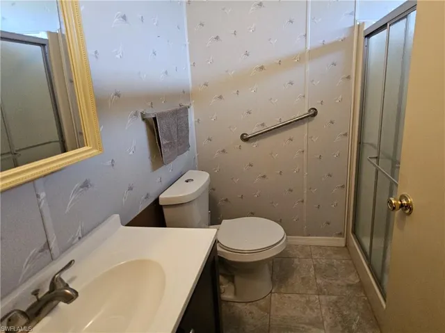 Ensuite bathroom with a shower stall