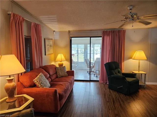Living area featuring sliding doors to sunroom