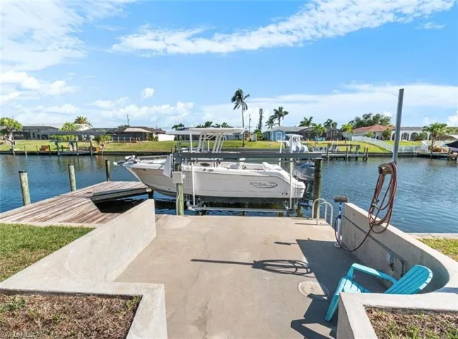 Dock featuring a 10,000 lb boat lift