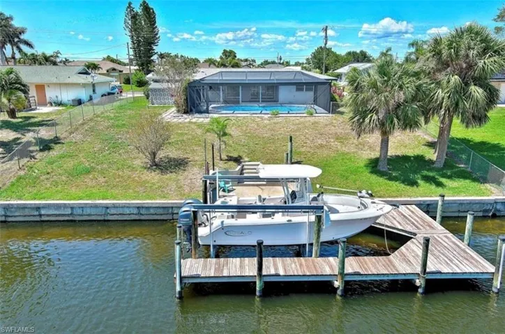Dock featuring boat lift, and, waterview