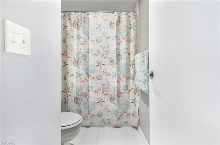 Bathroom with tile floors and toilet