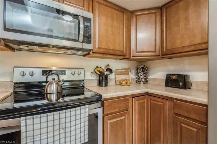 Kitchen featuring appliances with stainless steel finishes