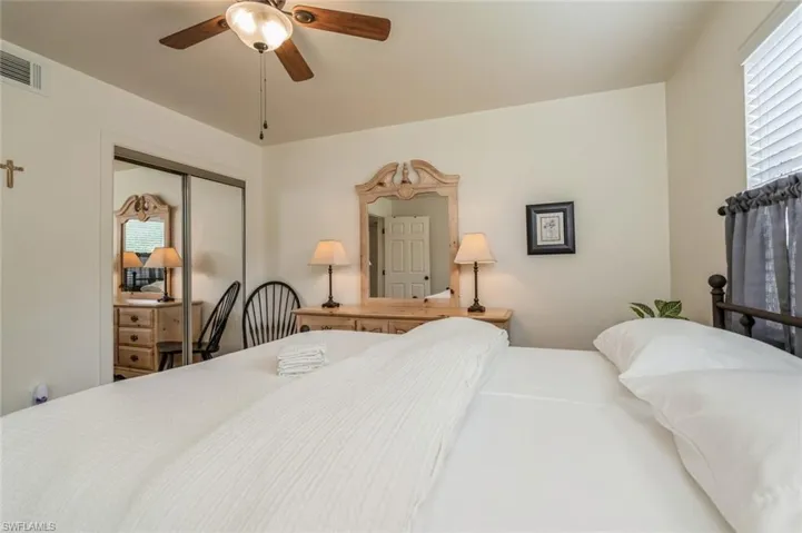 Bedroom featuring a closet and ceiling fan