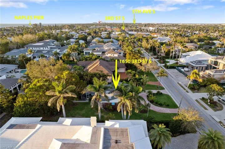 Birds eye view of property featuring a residential view and proximity to third Avenue south shopping, fifth Avenue, dining, and the Naples pier sunsets!