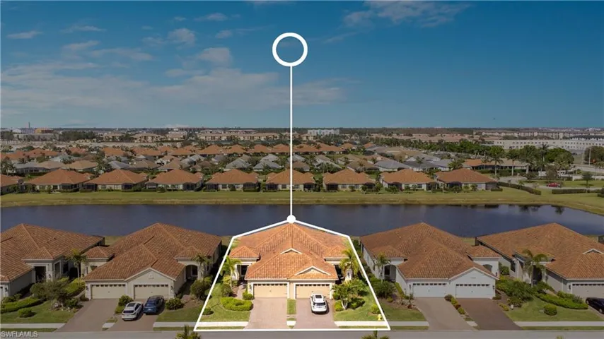 Drone / aerial view featuring a water view and a residential view