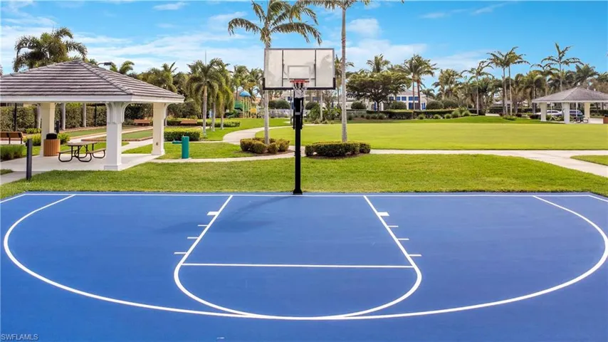 View of sport court featuring community basketball court, a lawn, and a gazebo
