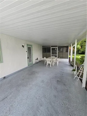 View of asphalt street featuring a residential view