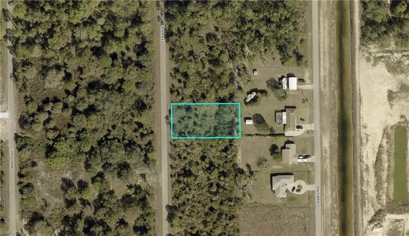 Aerial map of property and surrounding area with property parcel outlined