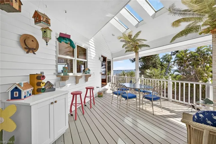 Wooden terrace with outdoor dining area
