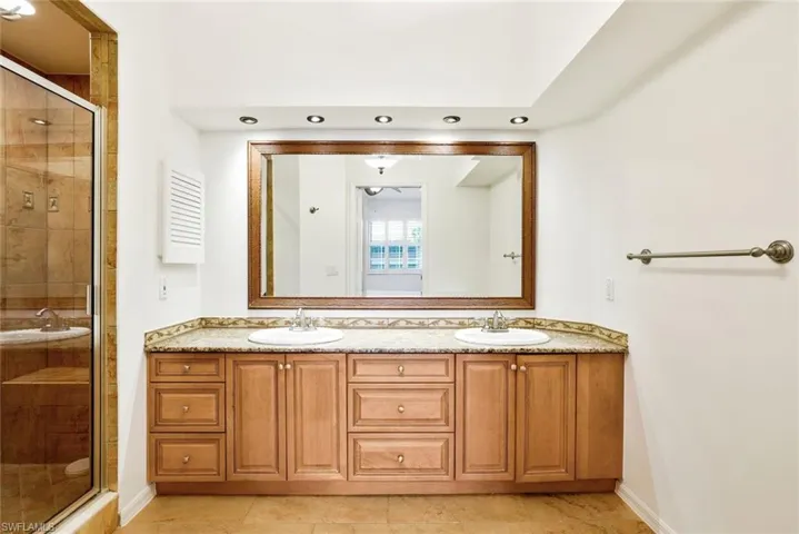 Master bath with dual sinks, double vanities and spacious shower