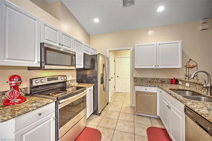 Kitchen with stainless steel appliances.