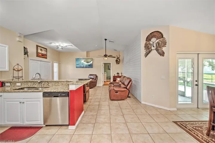Breakfast Bar, open concept, granite tops and tile flooring.
