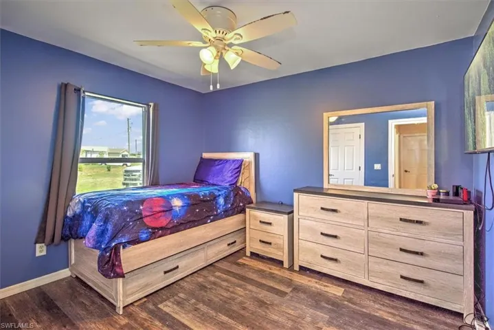 Bedroom 2 vinyl plank fooring and ceiling fan