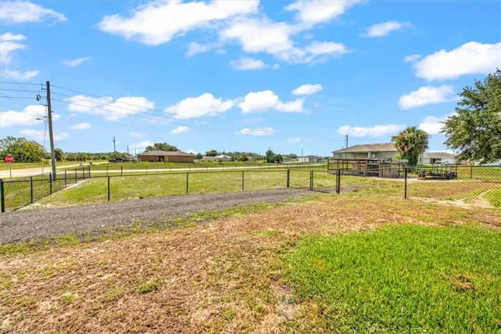 View of yard with recently permitted and approved driveway & culvert.