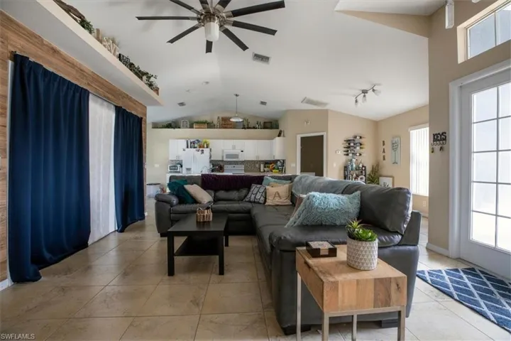 View from bedrooms to Living area (shown furnished)