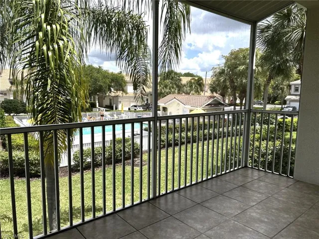 Screened lanai featuring a view of the pool