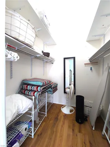 Primary walk-in closet.