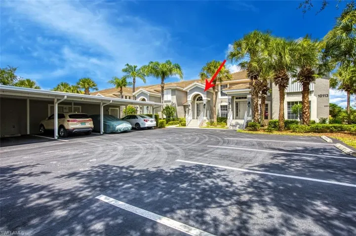 View of front of house featuring a carport
