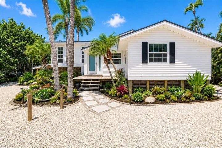 VIRTUALLY RENOVATED AND LANDSCAPED