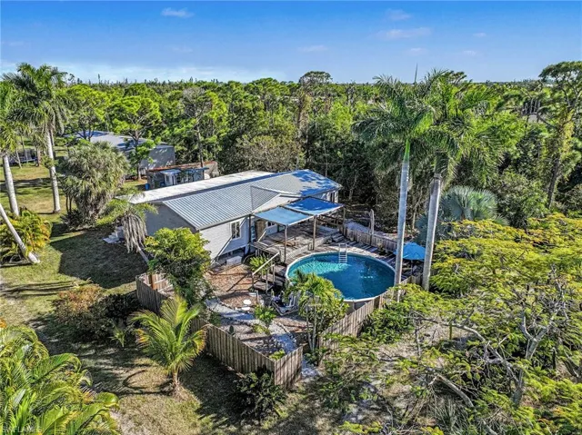 View from above of property featuring a pool