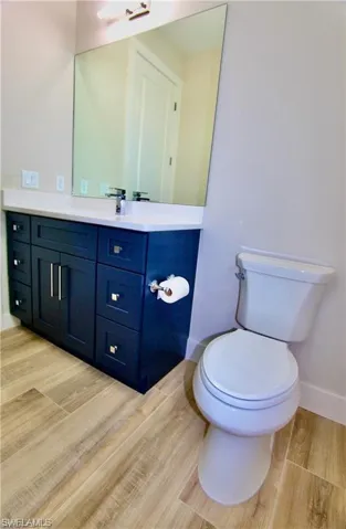 Bathroom featuring toilet and vanity