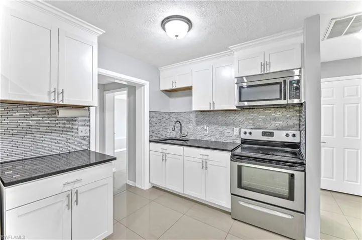 1122  Wesley W ST, Lehigh Acres, FL 33936