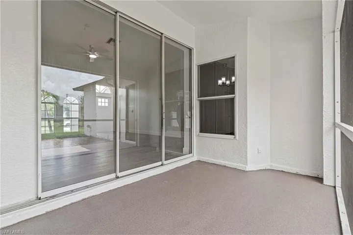 View of patio featuring ceiling fan
