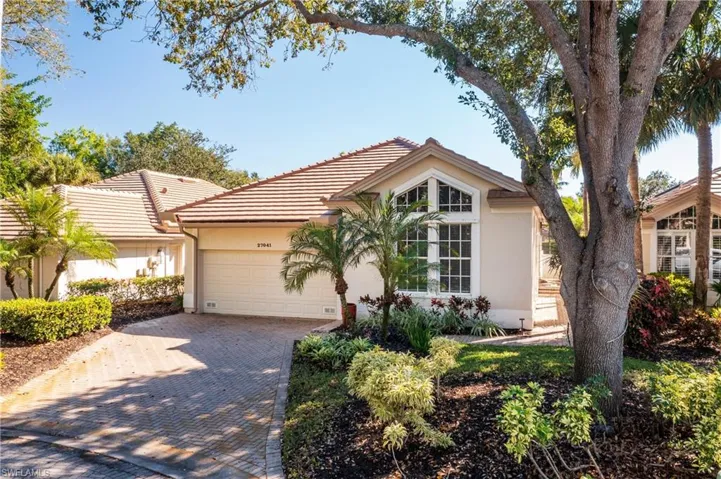 Welcome to 27041 Enclave Drive located on a private and tranquil cul de sac in The Enclave at Bonita Bay.